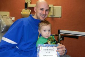 Mylan Hammons with his father, Brett Hammons, has his first visit to the dentist at age one!
